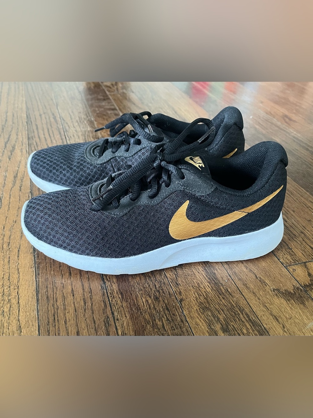Nike Black and Gold Sneakers